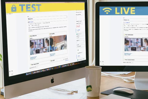 Two monitors on a desk. The first monitor is displaying a page from Acquia in the edit mode, at the top of the page there is a bar with a padlock and text displaying test. The second monitor is also stating a page from Acquia in the edit mode, at the top of the page there is a bar with an Internet symbol and the text stating live.